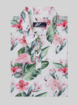 A summer floral polo in white and pink. Designed in the UK for men.
