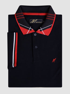 A navy polo with red collar detail.