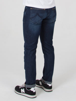 Tapered fit washed indigo blue with slight sanding mid stretch mens denim jean mish mash