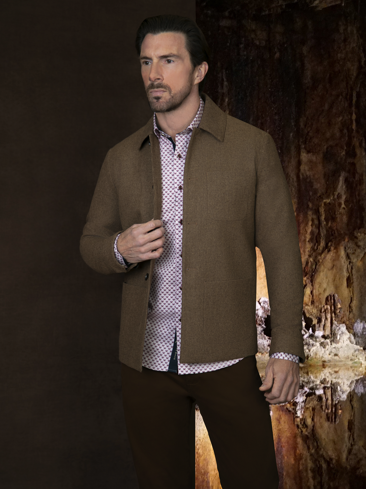 A man wearing the baltoro camel wool smart structured jacket with a bromley chino trousers.