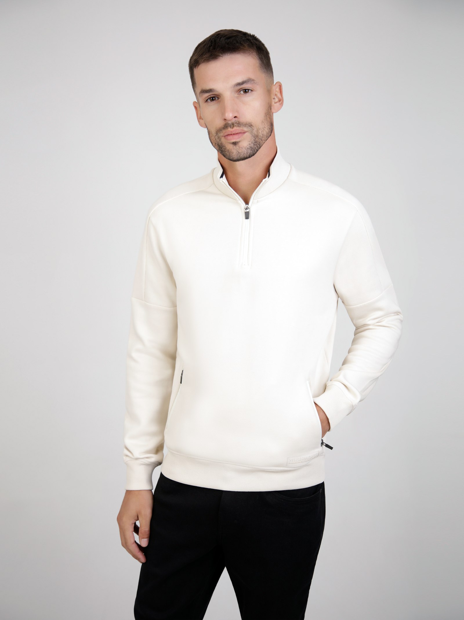 A gardenia long sleeve 3/4 zip sweat top for men.