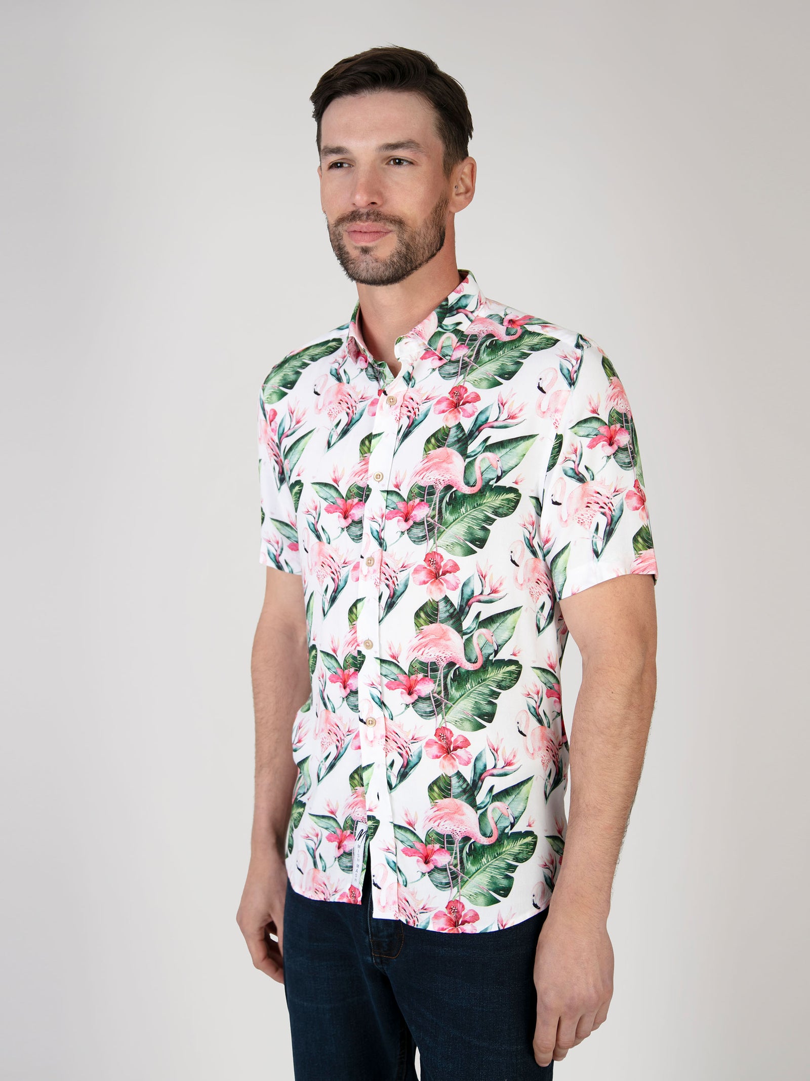 A summer floral shirt in white and pink. Designed in the UK for men. 