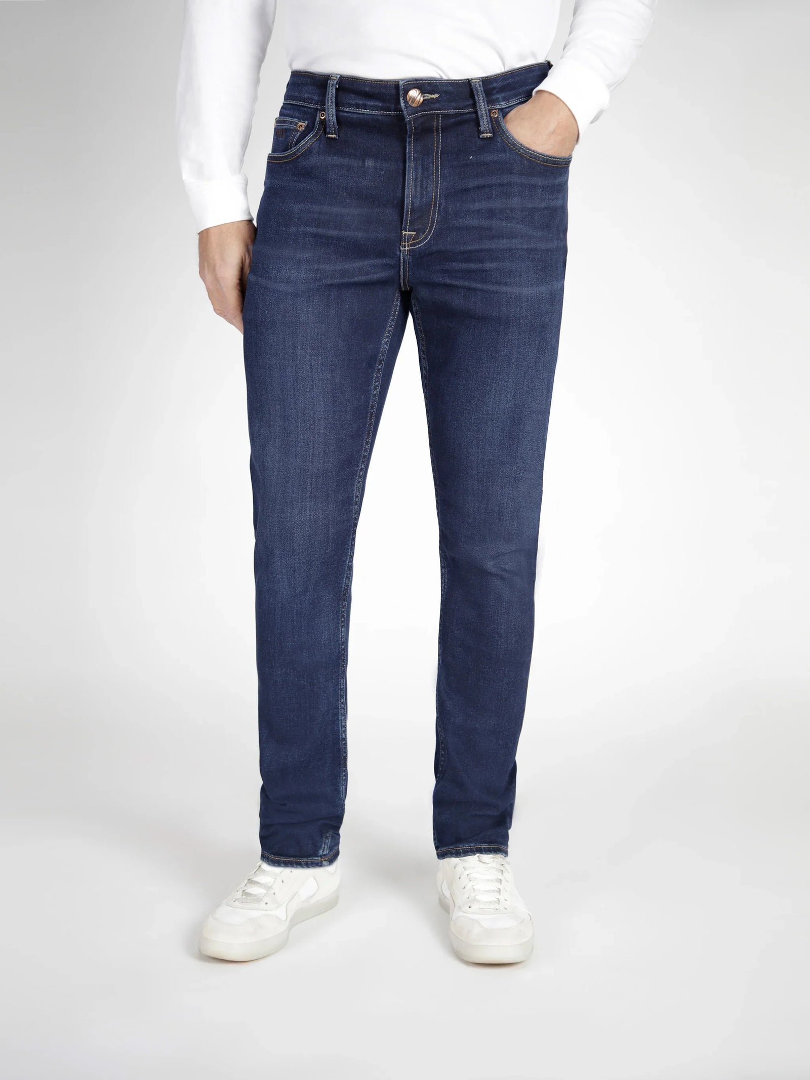 Front view - A deep indigo denim jean designed for men.