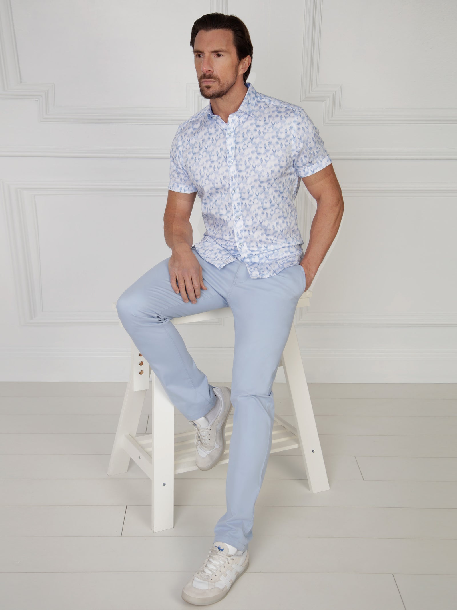 Navy and white short sleeve shirt with abstract print. Menswear UK