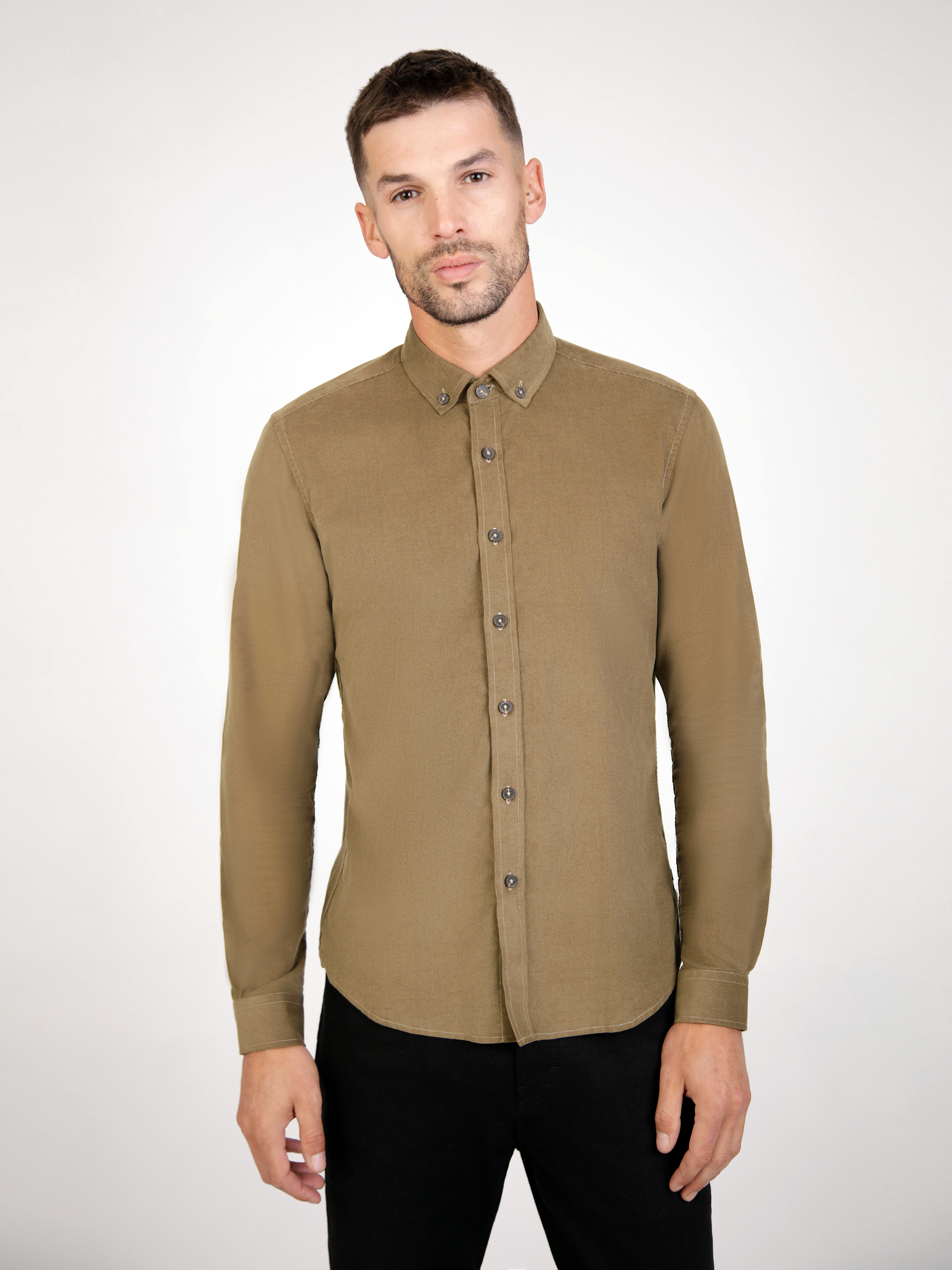 Long sleeve cord khaki shirt.