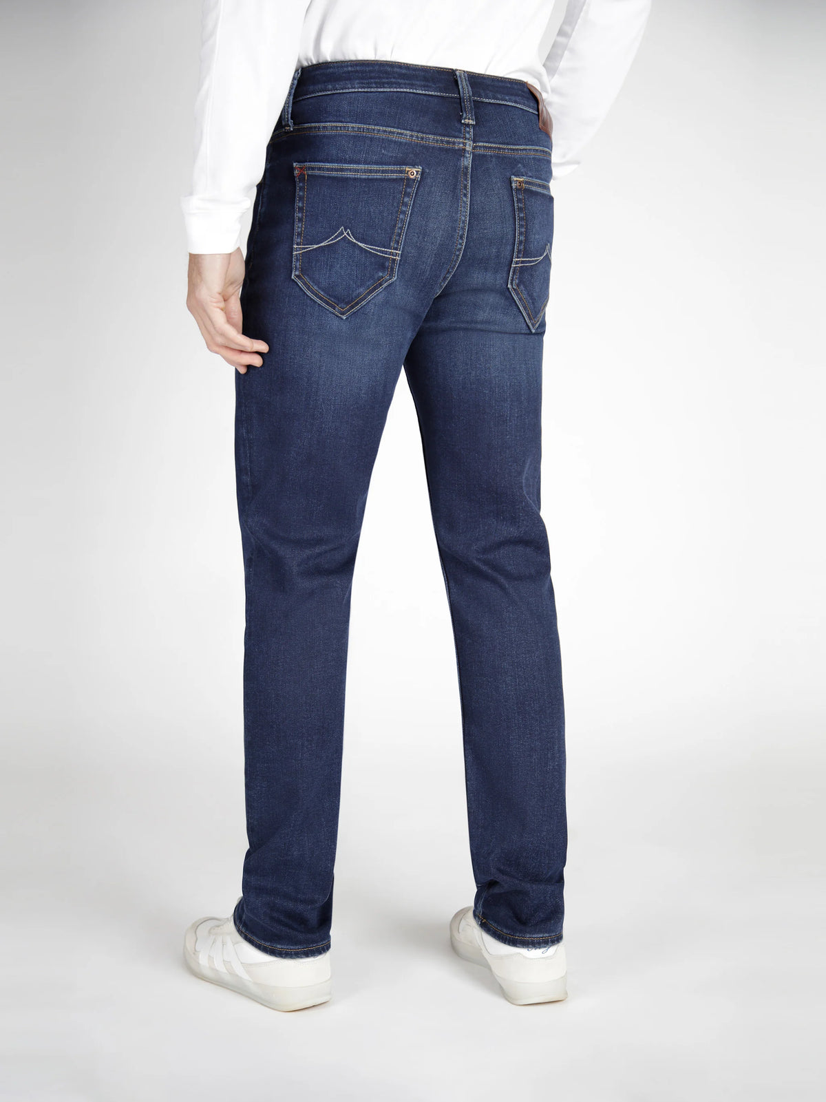 Back view - A deep indigo denim jean designed for men.