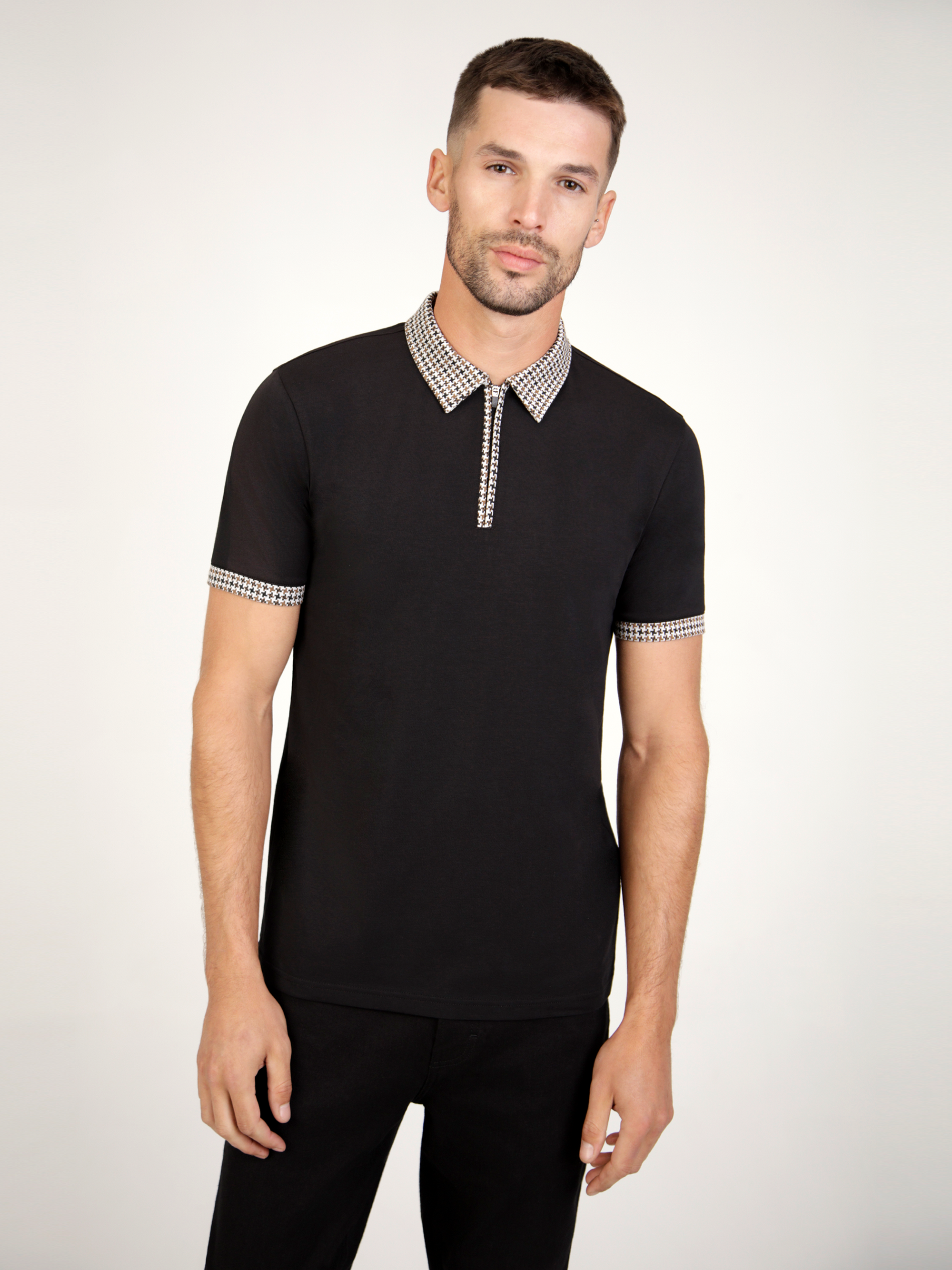 Nashi Black polo shirt with jacquard houndstooth collar and cuff, smart casual style, front zip fastening.