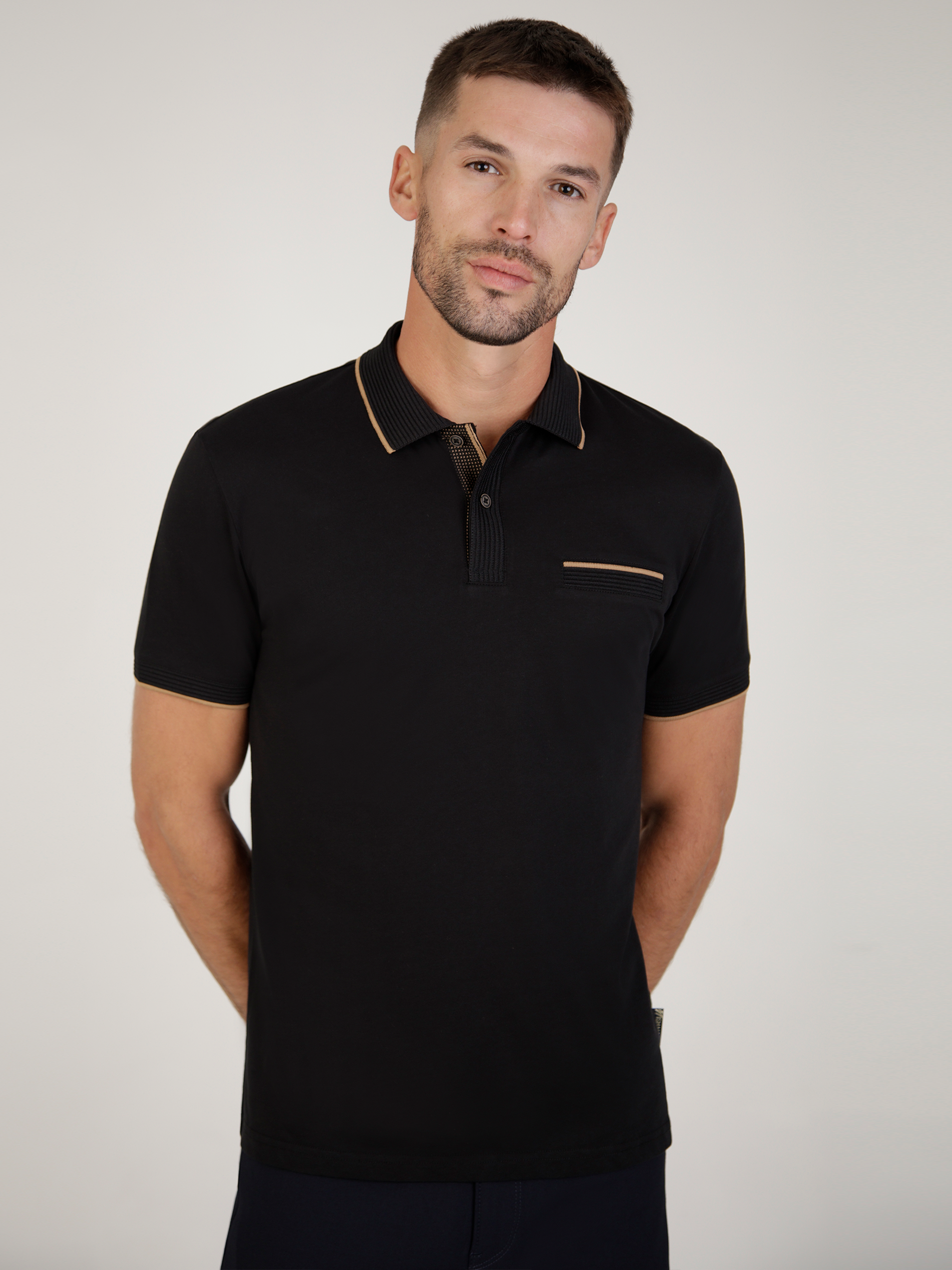 Tonto Black short sleeve polo shirt with textured rib collar and contrast tipping detail.