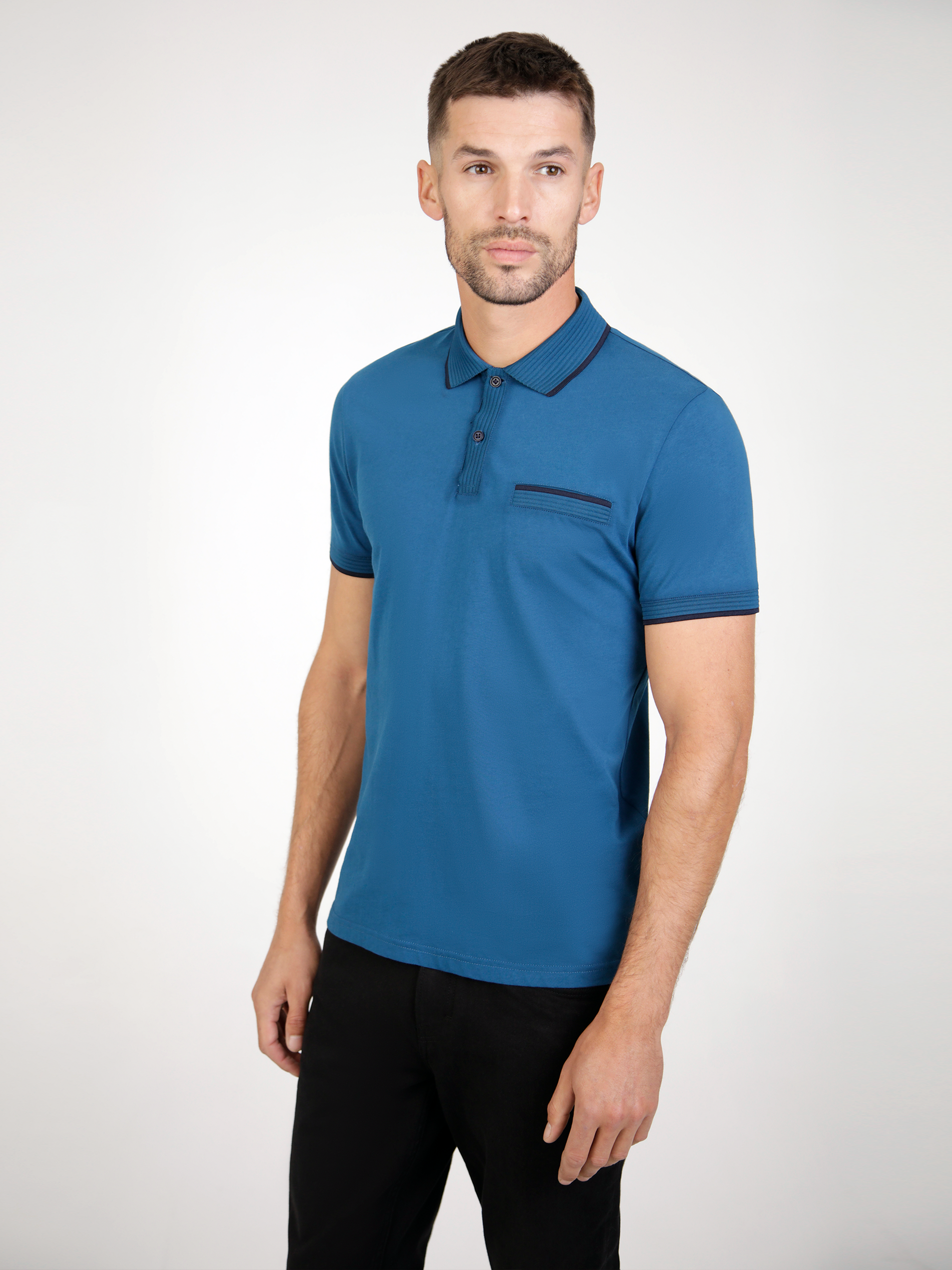 Tonto Teal short sleeve polo shirt with textured rib collar, placket, and contrast tipping, folded neatly.