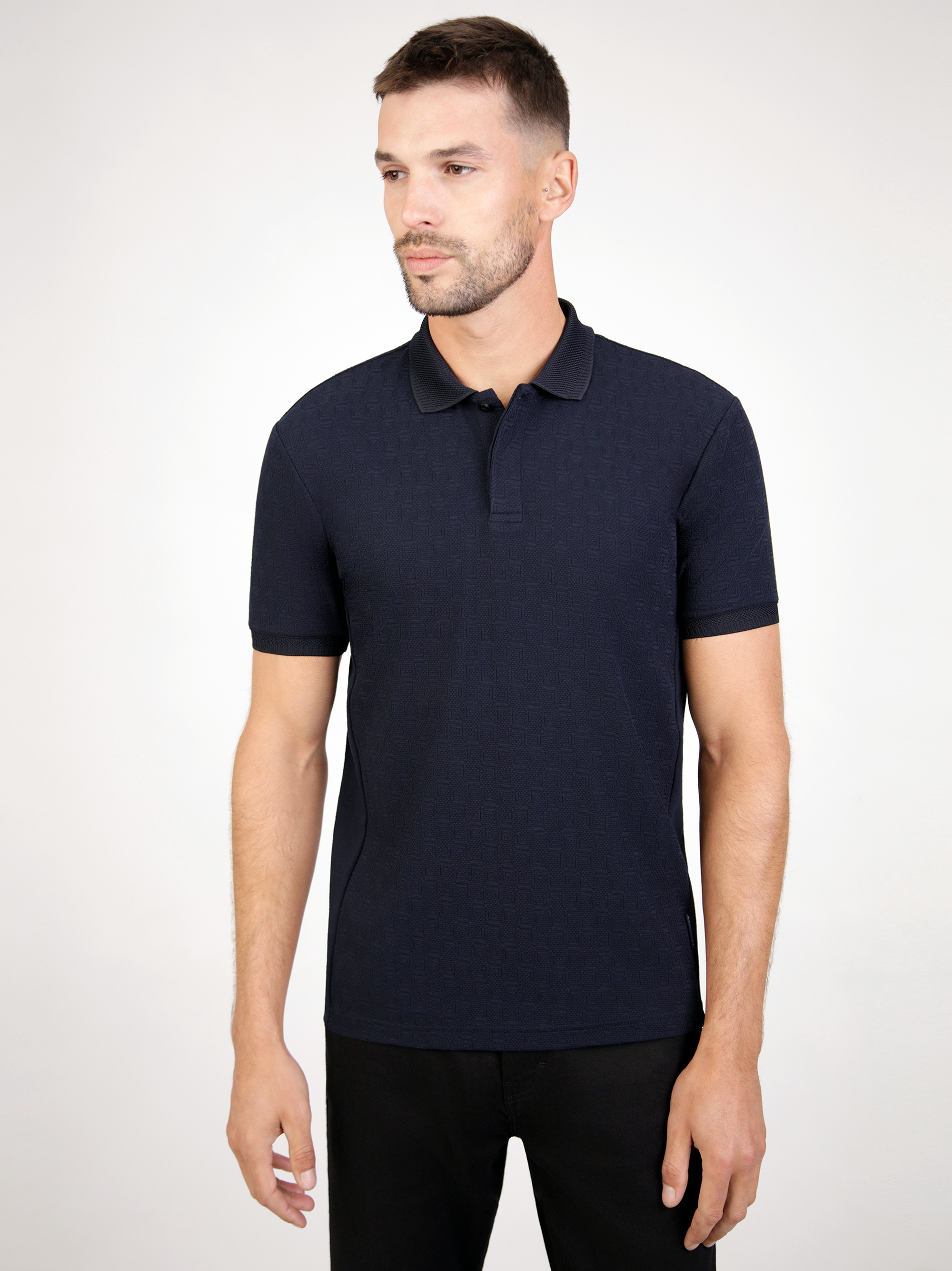 Twister Navy short sleeve polo shirt with engineered rib collar and side panel details.