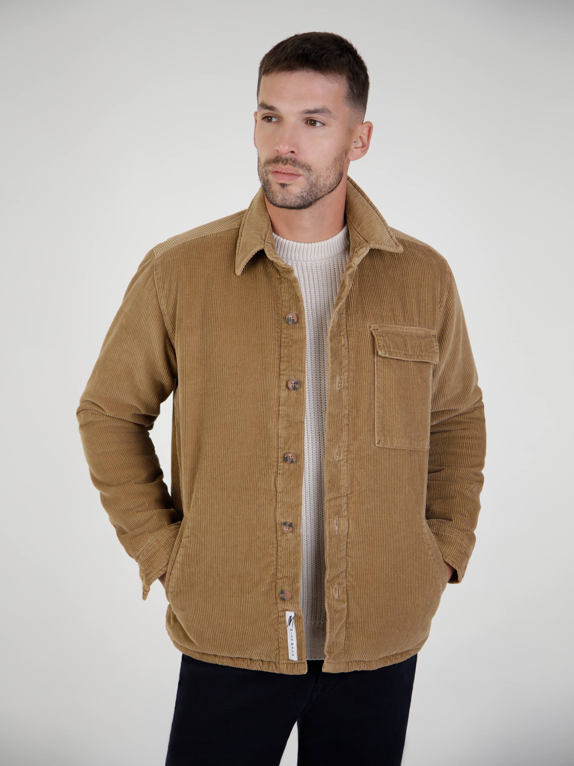 Vanguard Camel Cord Jacket in brown, featuring a button front, chest pocket, and lightweight corduroy fabric.