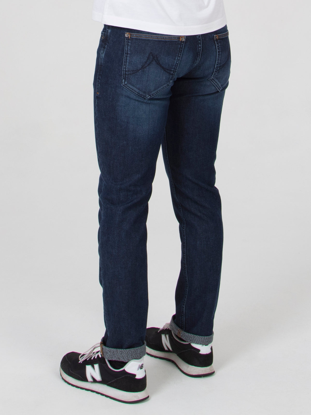 Tapered fit washed indigo blue with slight sanding mid stretch mens denim jean mish mash